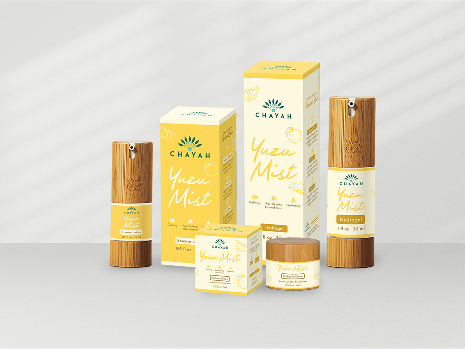 Chayah skincare products including bottles, boxes, and a jar on a light gray background